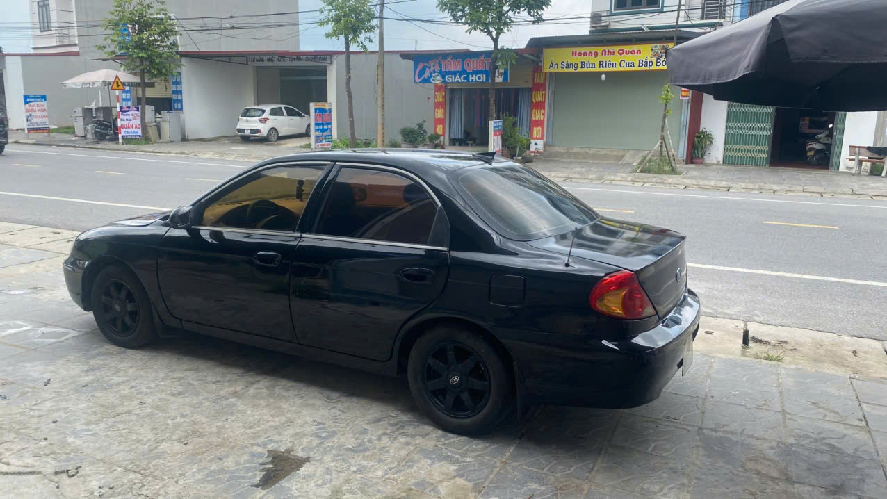 Cần bán xe Kia Spectra 2003 - Giá chỉ 45 triệu